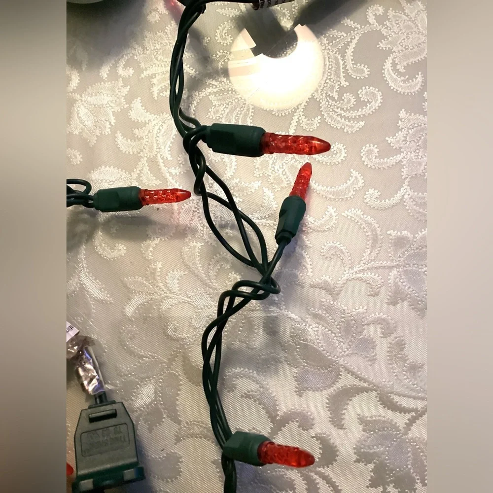 2 Christmas string lights. Red Skinny faceted bulbs 1”